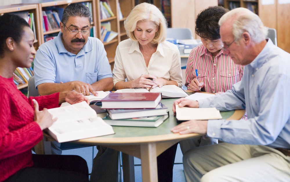 Group of teachers working together around a table