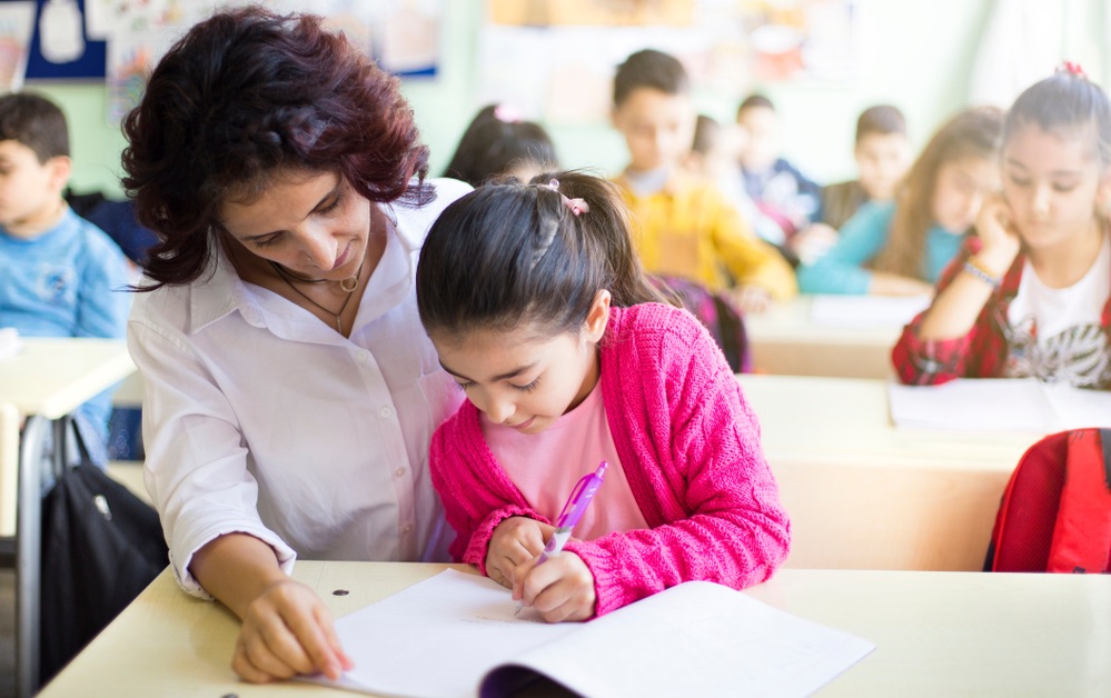 Teacher working with individual student